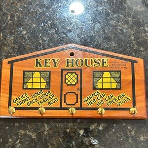 Vintage Wooden Key Holder with Yellow and Black Design